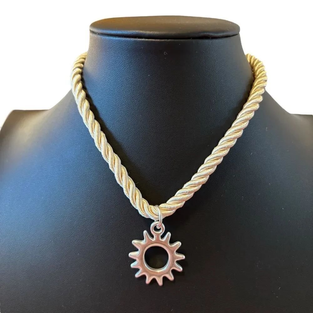 Matte Silver Sunburst Twisted Rope Necklace.